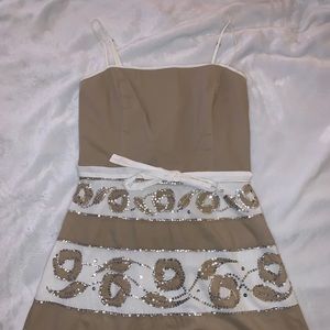 beige and white pattern strap dress